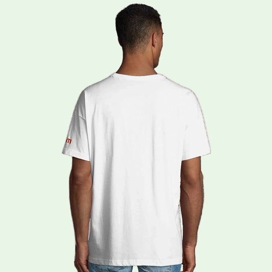 Man wearing organic cotton in conversion white tee, back view.