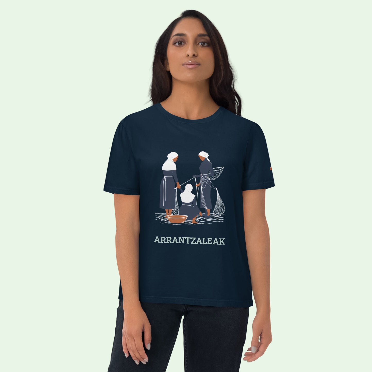 woman wearing an organic cotton t-shirt gots certified in navy with fisherwomen front design by Aunti