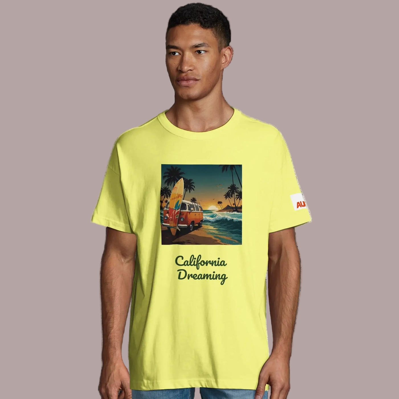 man wearing an organic california dreaming front design tee in yellow