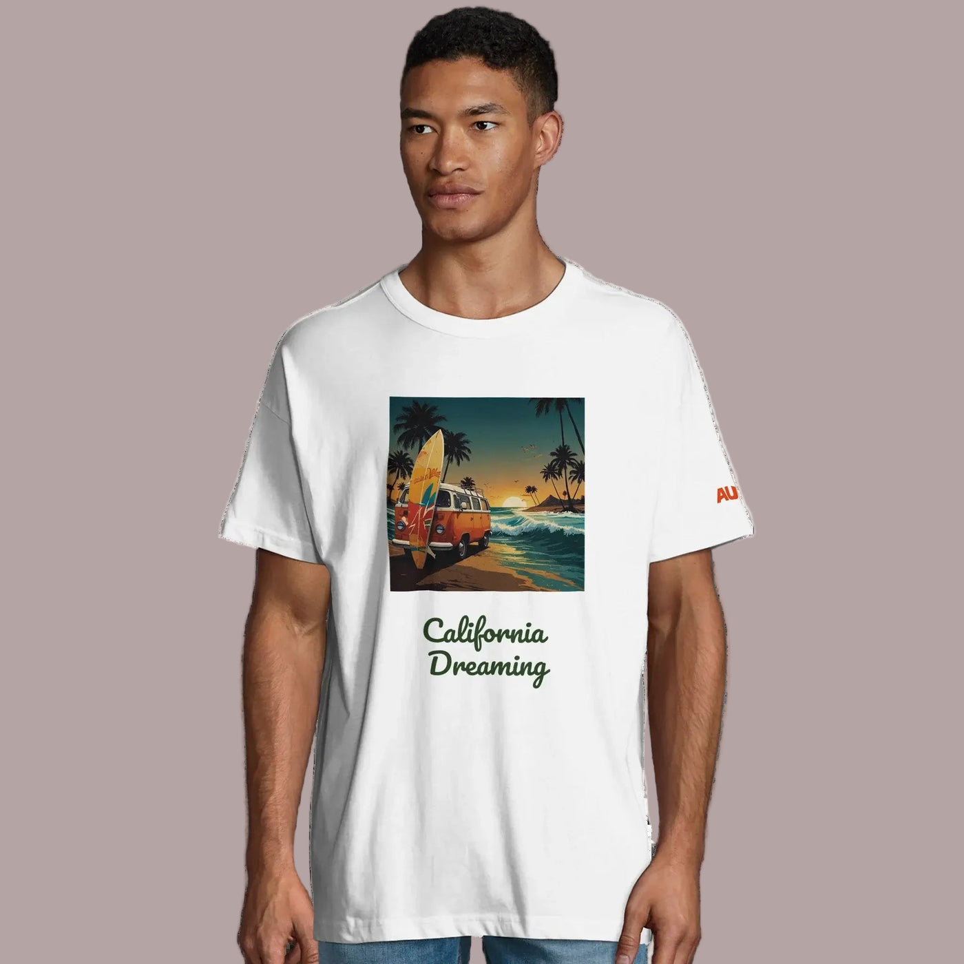 a man wearing an organic t-shirt from AUNTI with a retro surf design on the front