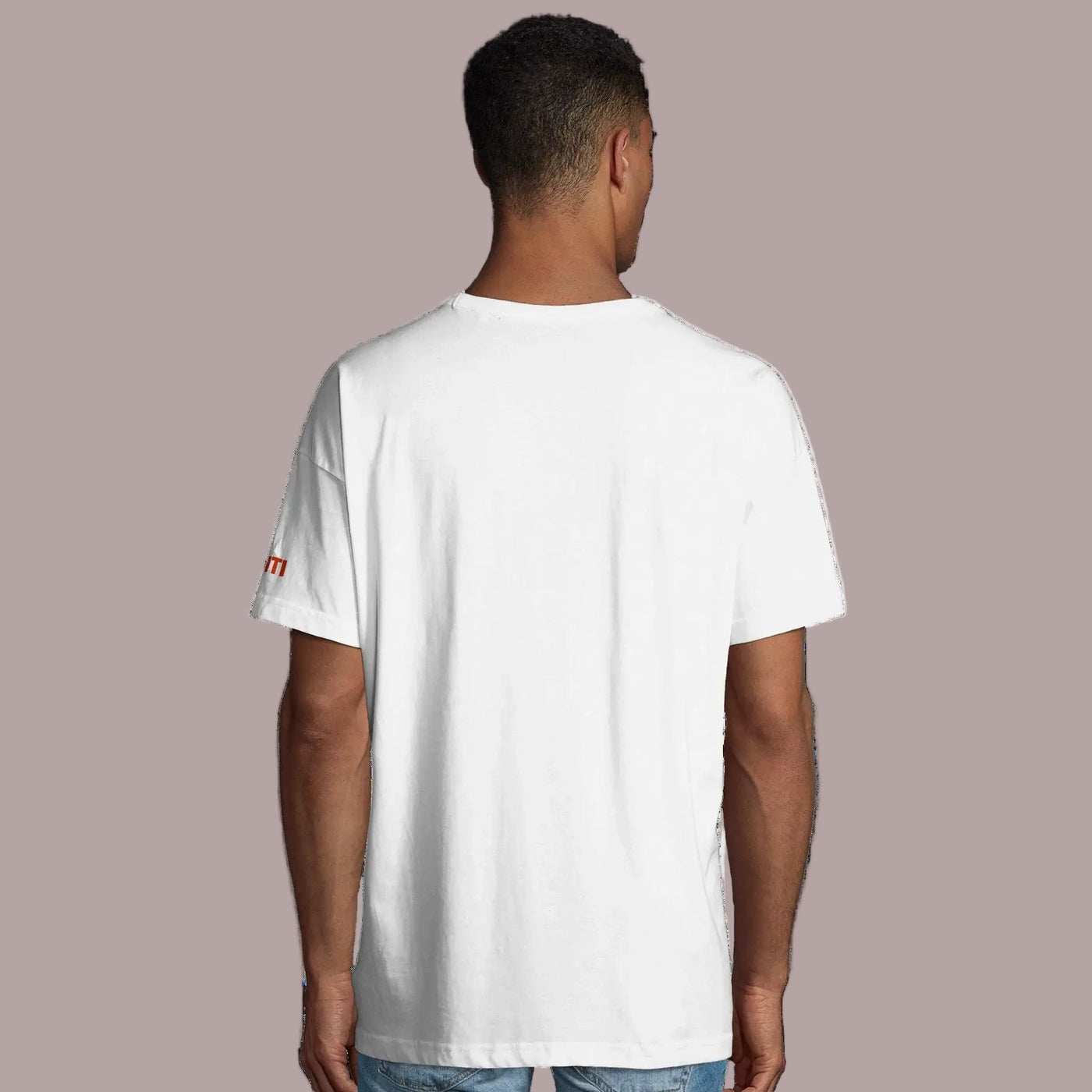 a man wearing a white organic tee back view