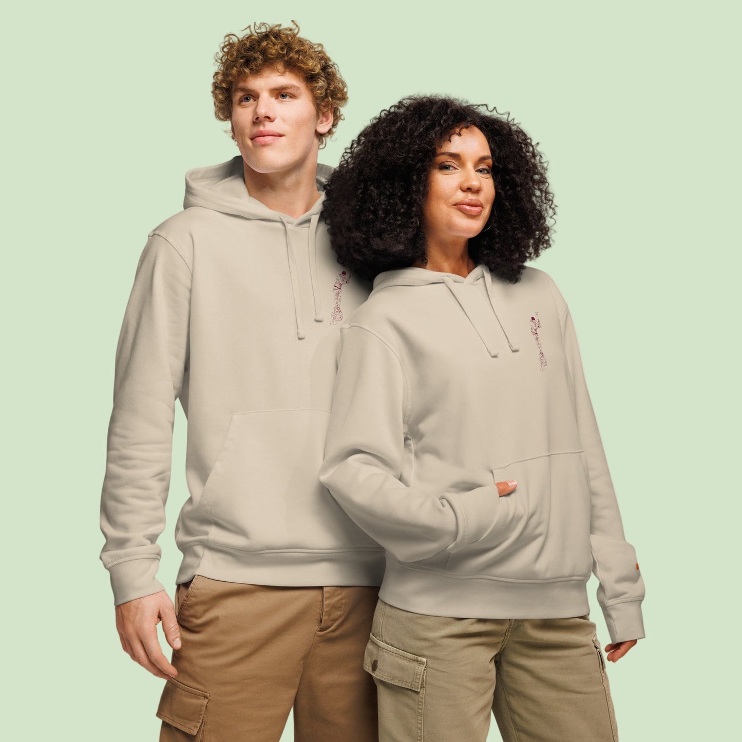 Couple wearing organic hoodie in desert dust with aizkolari design by Aunti